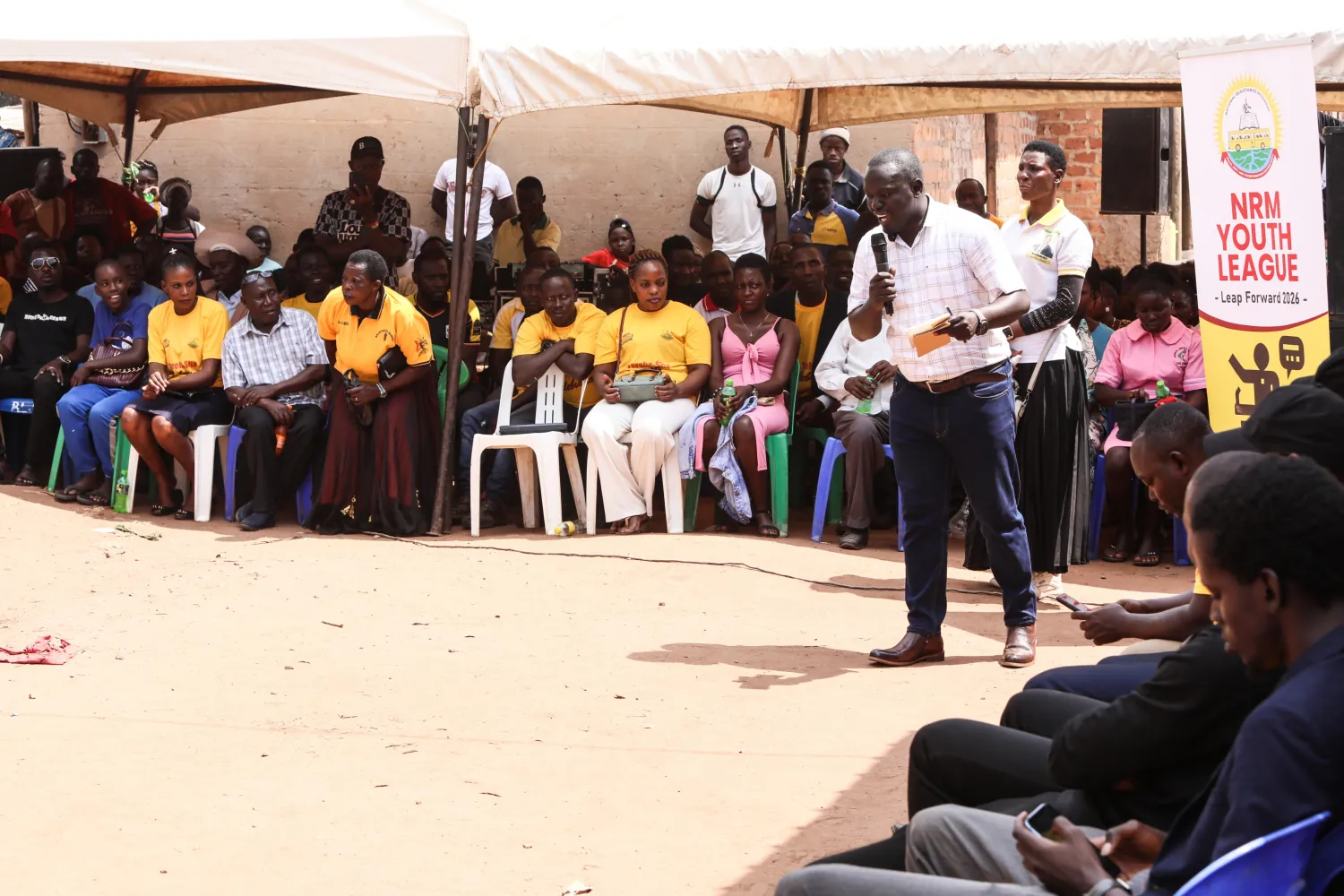NRM youth leaders donate iron sheets to roof Luwero Market